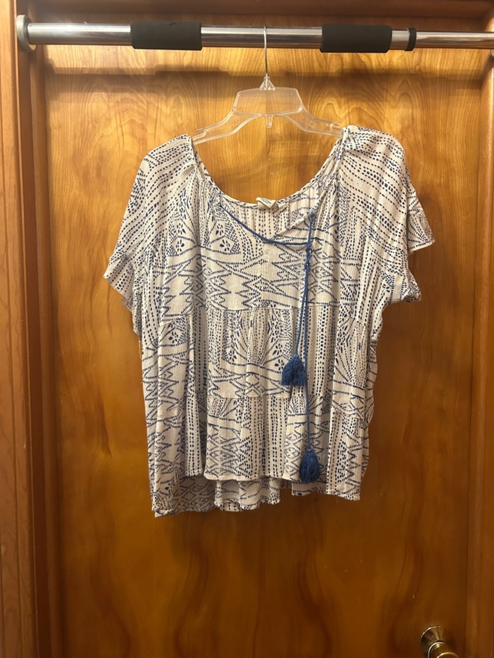Relaxed Cream Blouse with Blue Boho Print and Tassel Tie
